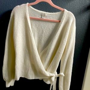Cream sweater.